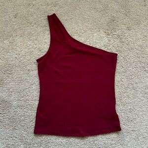 One shoulder top.
